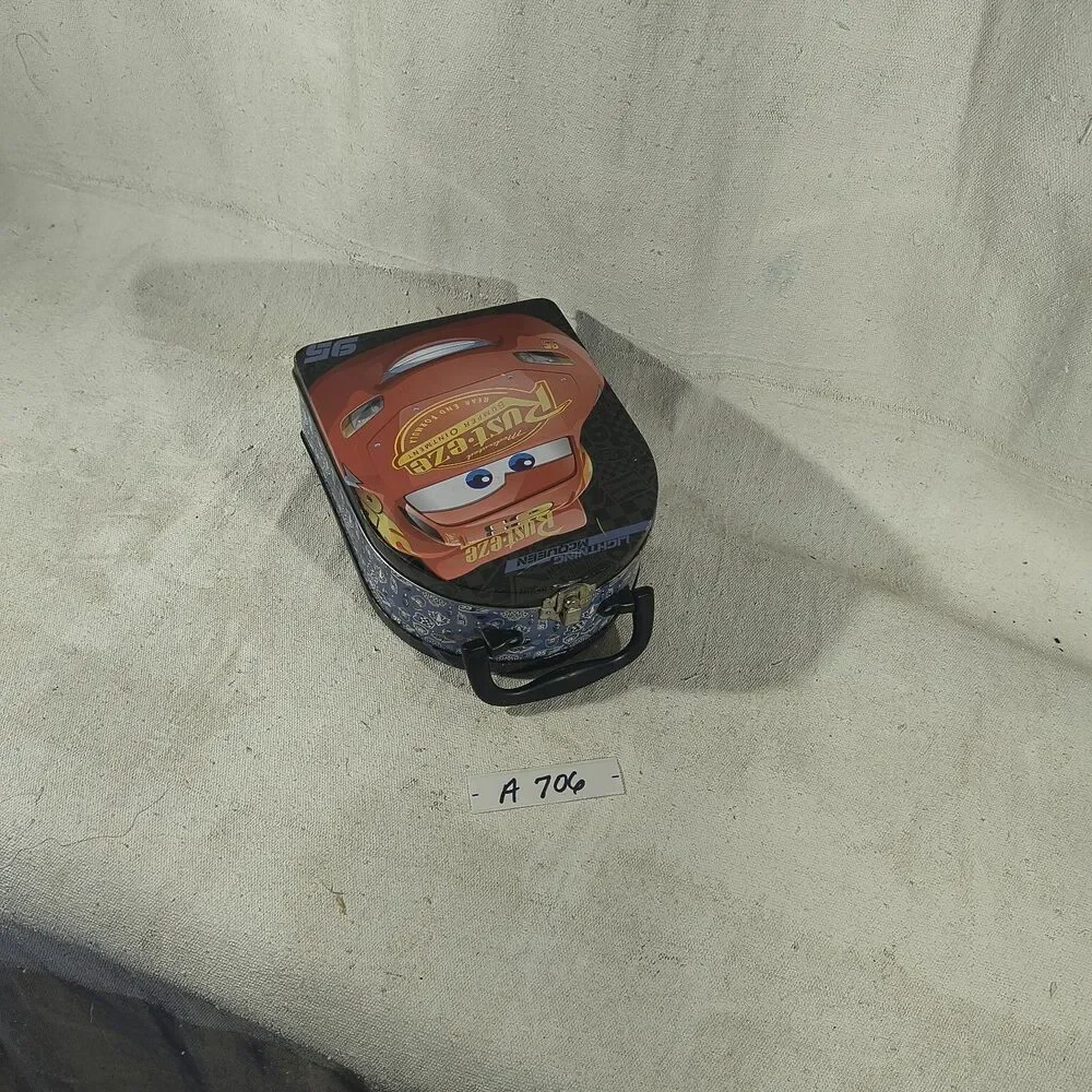Metal lunch box featuring Lightening Mcqueen by Disney Pixar Cars